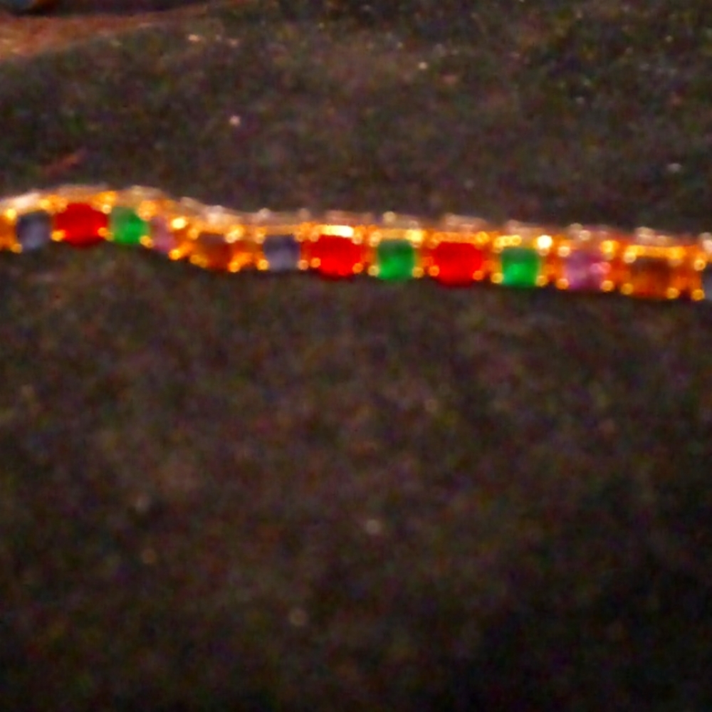Beautiful Joan Rivers reversible bracelet multi colored crystals